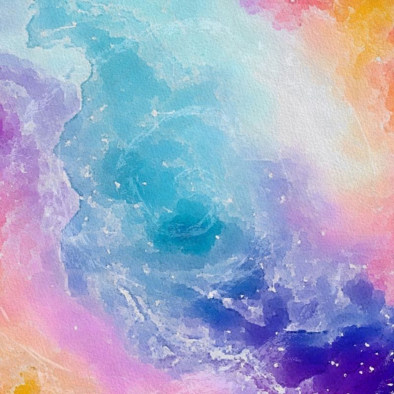 青と紫を基調にピンクやオレンジが混ざるグラデーションカラーの背景